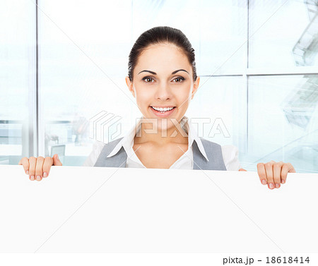 businesswoman holding a blank white card board businesswoman holding a blank white card board 18618414