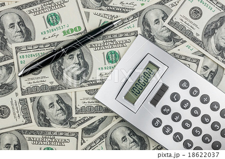 Pen,calculator and dollars  closeup. 18622037