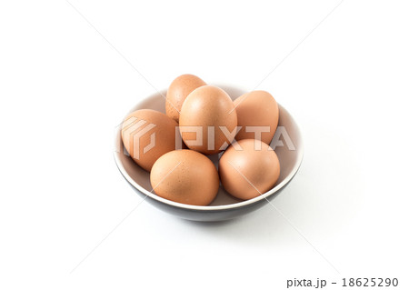 Brown Egg in dish on white background Brown Egg in dish on white background 18625290