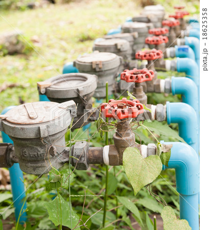 Water Meter and Red Valve Water Meter and Red Valve 18625358