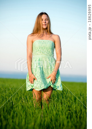 Happy vitality freedom girl stands with her hands Happy vitality freedom girl stands with her hands 18626995
