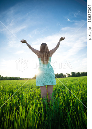 Happiness woman stay outdoor under sunlight of Happiness woman stay outdoor under sunlight of 18627002