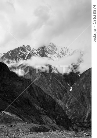 mountain peaks through the clouds mountain peaks through the clouds 18628874