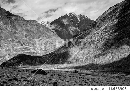 mountain peaks through the clouds mountain peaks through the clouds 18628903