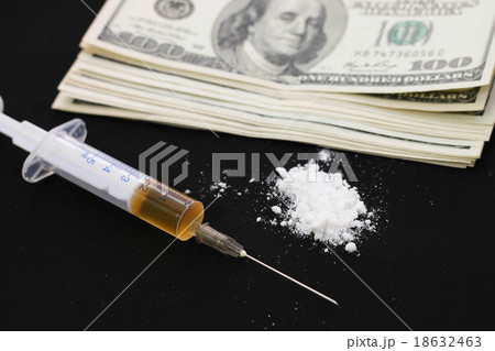 Syringe, cocaine and dollars on a black background Syringe, cocaine and dollars on a black background 18632463