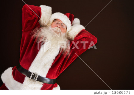 Composite image of sleeping santa Composite image of sleeping santa 18636575
