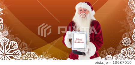 Composite image of santa presents a tablet pc Composite image of santa presents a tablet pc 18637010