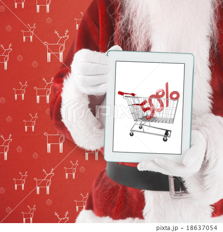 Composite image of santa presents a tablet pc Composite image of santa presents a tablet pc 18637054
