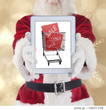 Composite image of santa presents a tablet pc Composite image of santa presents a tablet pc 18637106