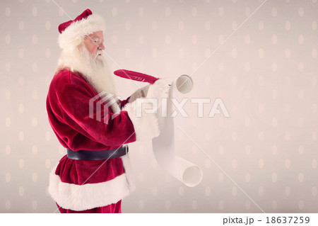 Composite image of father christmas writes a list 18637259