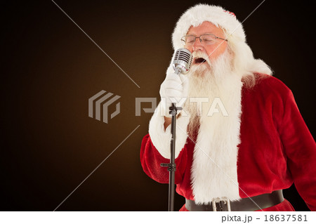 Composite image of santa claus is singing christmas songs Composite image of santa claus is singing christmas songs 18637581