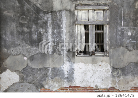 old window in an ancient brick wall old window in an ancient brick wall 18641478