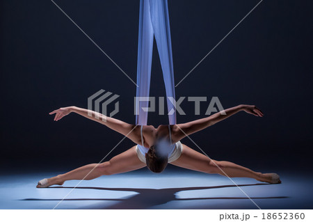 Young beautiful dancer in beige dress posing on Young beautiful dancer in beige dress posing on 18652360