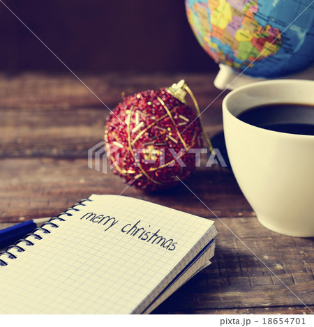 bauble, coffee, globe and text merry christmas 18654701