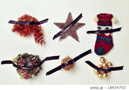 christmas ornaments attached to the wall with tape 18654702