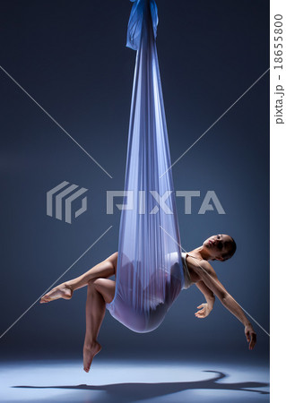 Young beautiful dancer in beige dress posing on Young beautiful dancer in beige dress posing on 18655800