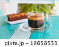 black coffee cup on white blue table 18658533