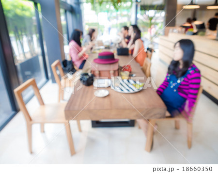 blurred background of talking people in cafe blurred background of talking people in cafe 18660350
