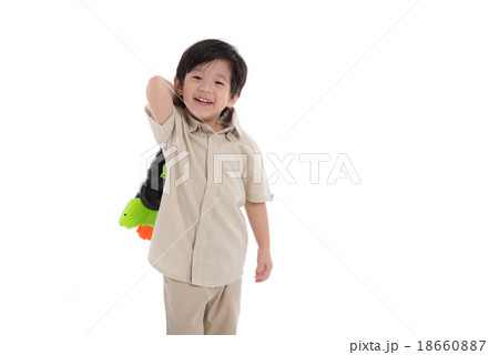 Cute asian boy playing toy gun Cute asian boy playing toy gun 18660887
