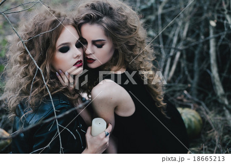 Two vintage witches gathered eve of Halloween 18665213