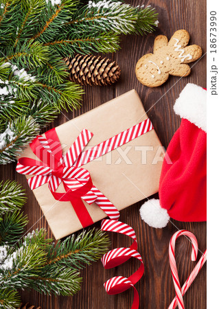 Christmas tree branch with gift box Christmas tree branch with gift box 18673990