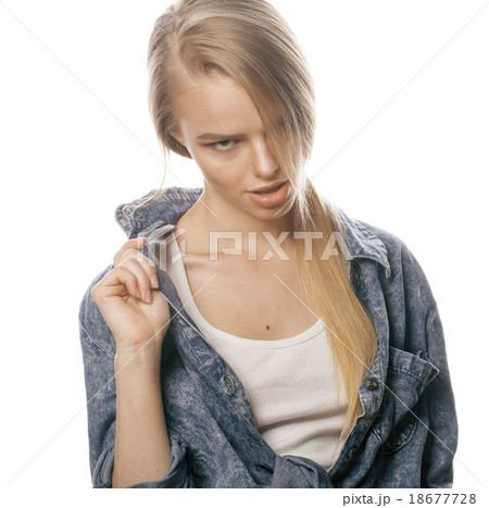 young blond woman on white backgroung gesture 18677728