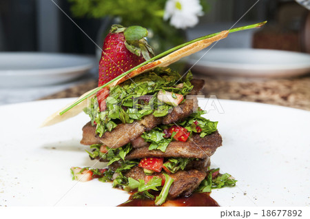 foie gras garnished with strawberries foie gras garnished with strawberries 18677892