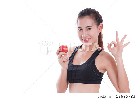 woman holding apple and showing ok sign woman holding apple and showing ok sign 18685733