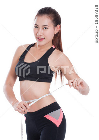 Fitness woman taking measurements of her body Fitness woman taking measurements of her body 18687328