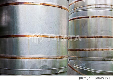 Close up of two vertical metal pipelines 18689151