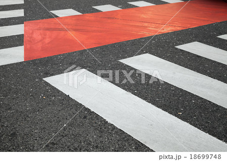White and red pedestrian crossing road marking 18699748