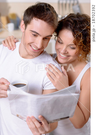 Happy couple drinking coffee  18702392