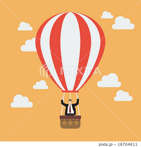 Businessman celebrating in hot air balloon 18704611