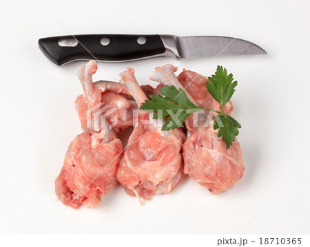 Raw skinless chicken drumsticks 18710365