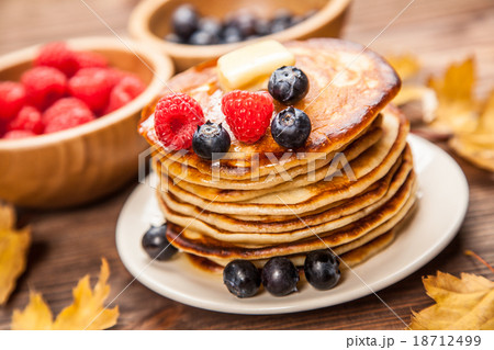 High pile of delicious pancakes High pile of delicious pancakes 18712499