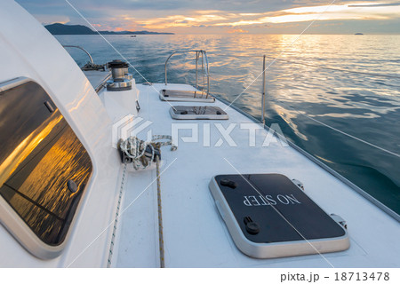 Empty catamaran yacht deck sailing on the sea Empty catamaran yacht deck sailing on the sea 18713478