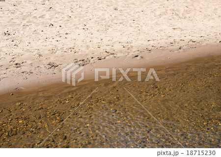 Stones under river, with water effect over them 18715230