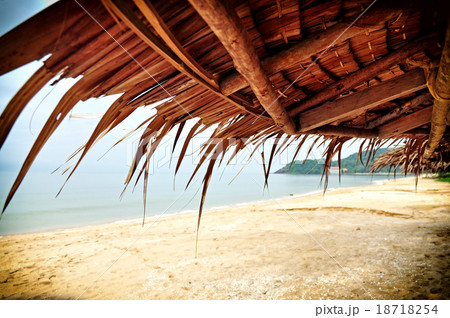 Asian thatch roof at the beach Asian thatch roof at the beach 18718254
