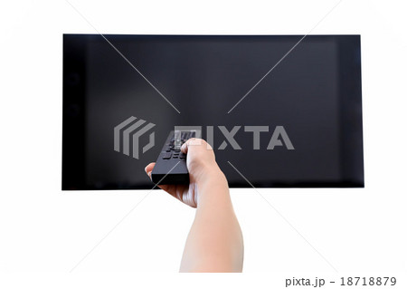 Hand holding remote control to the TV screen  18718879
