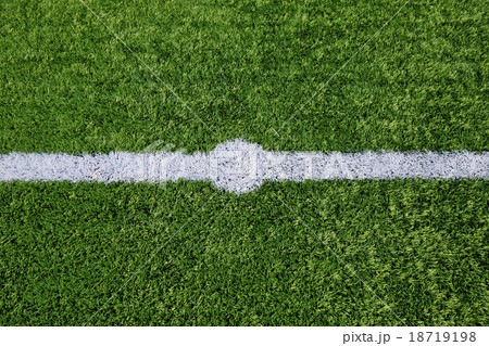 Straight white chalk line marking on grass 18719198