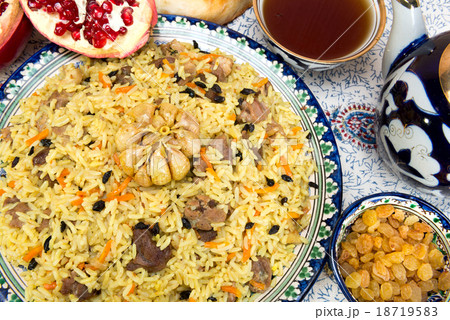 Pilaf - Eastern food - rice, oil, meat and spices Pilaf - Eastern food - rice, oil, meat and spices 18719583