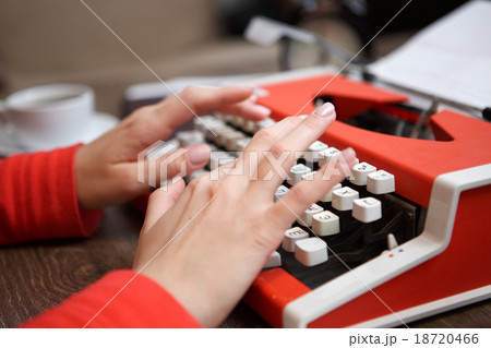 human hands writing on red typewriter human hands writing on red typewriter 18720466