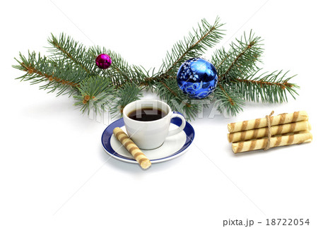 fir-tree branch with ornament, a cup of coffee 18722054