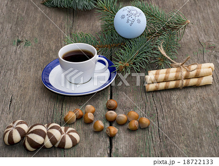 fir-tree branch, coffee, sweets, hazelnuts  18722133