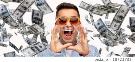face of shouting man with falling dollar money 18723732