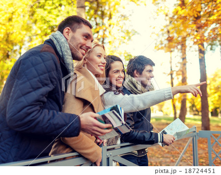 group of friends with map outdoors group of friends with map outdoors 18724451