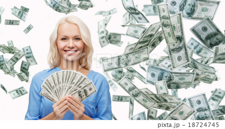 smiling businesswoman with dollar cash money 18724745