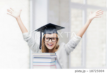 happy student in graduation cap happy student in graduation cap 18725004