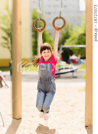 happy little girl on children playground 18725073
