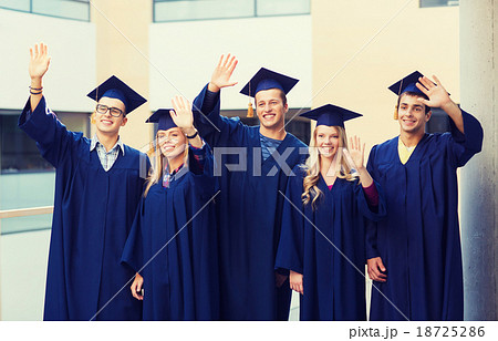 group of smiling students in mortarboards 18725286